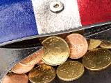 Un porte-monnaie aux couleurs bleu blanc rouge.