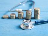 Un stthoscope et des pices de monnaie